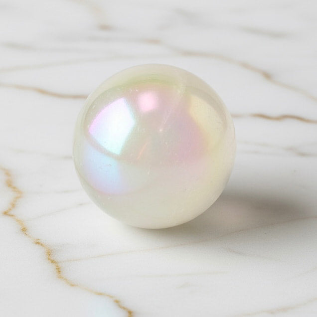 Bergkristall Aura Kugel - Schimmernde Eleganz CrystalScents