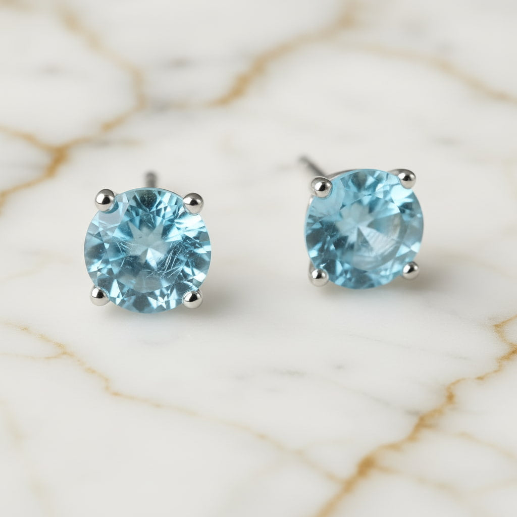 Topas Ohrringe – Feiner Glanz in kühlem Blau CrystalScents
