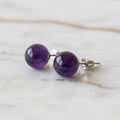 Amethyst Ohrstecker Kugel – Eleganz & Harmonie CrystalScents