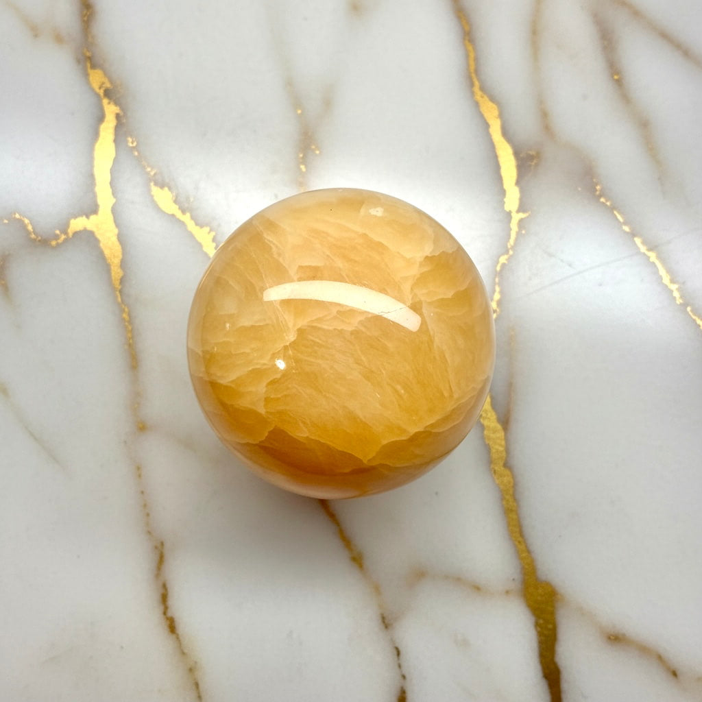 Calcit Kugel - Freude & Licht CrystalScents