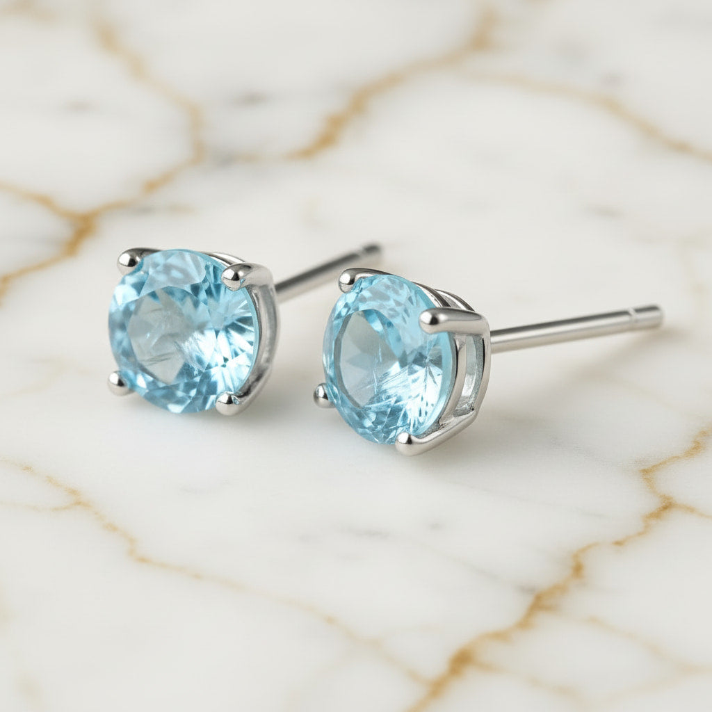 Topas Ohrringe – Feiner Glanz in kühlem Blau CrystalScents