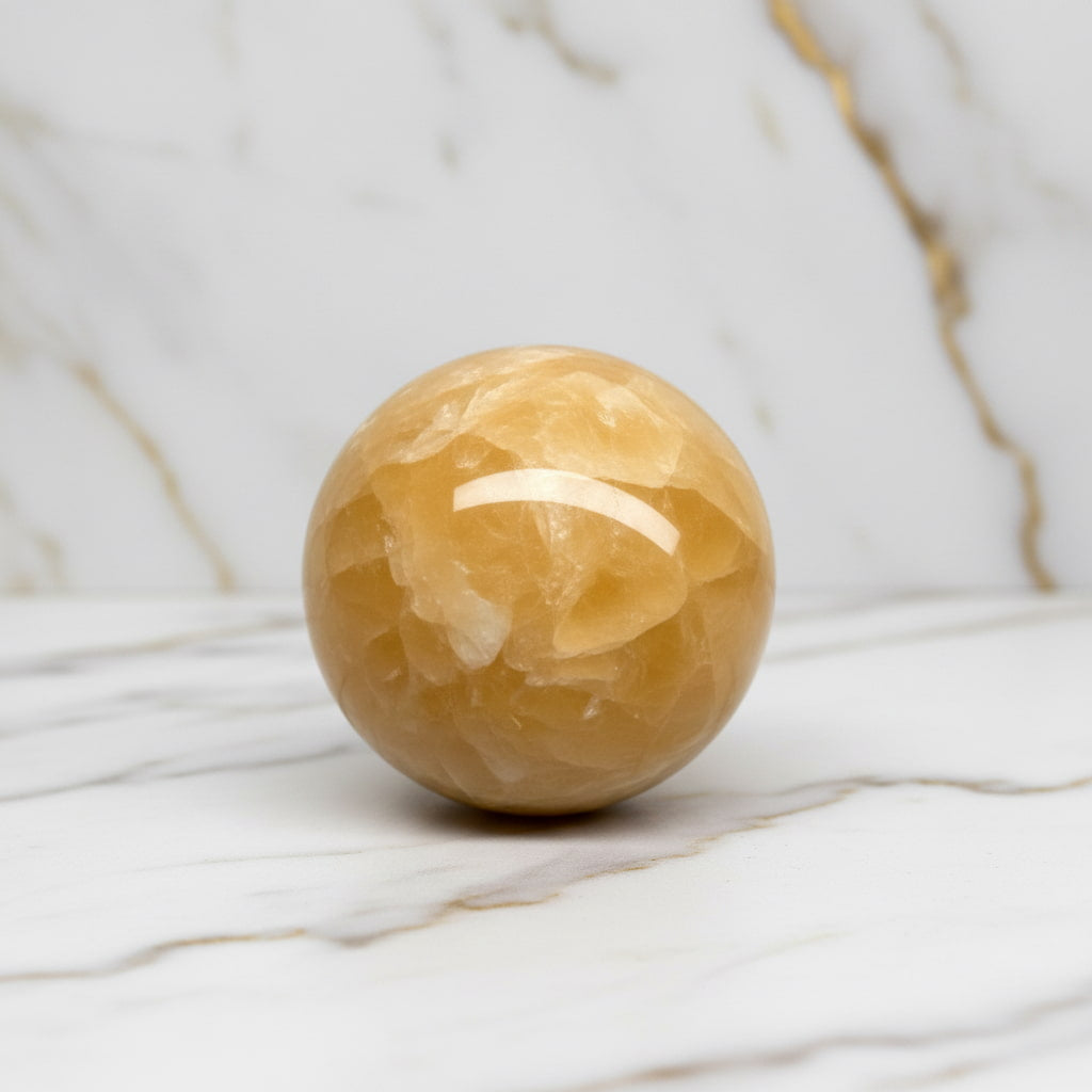 Calcit Kugel - Wärme & Kraft CrystalScents