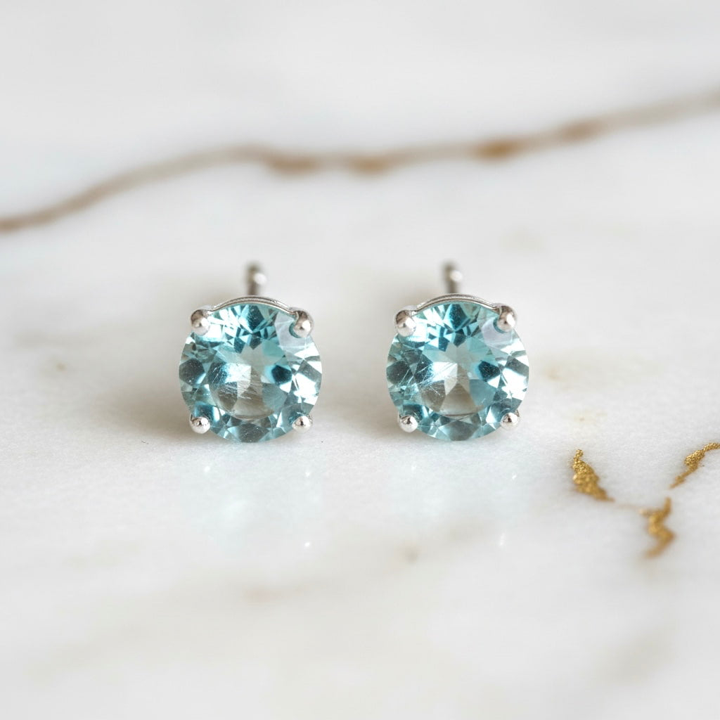 Topas Ohrringe – Feiner Glanz in kühlem Blau CrystalScents