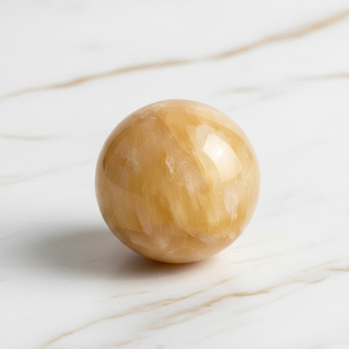 Calcit Kugel - Wärme & Kraft CrystalScents