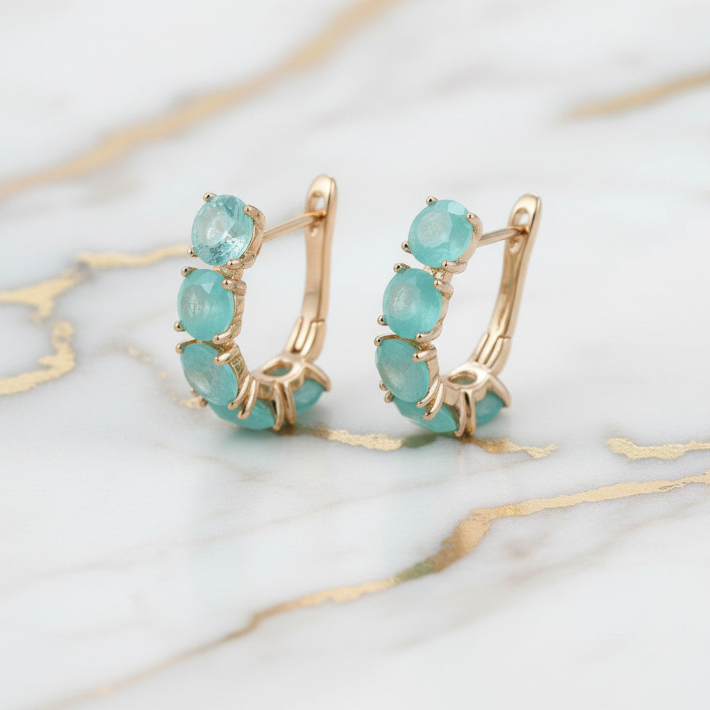 Ohrringe Gold – mit blauen Akzenten CrystalScents