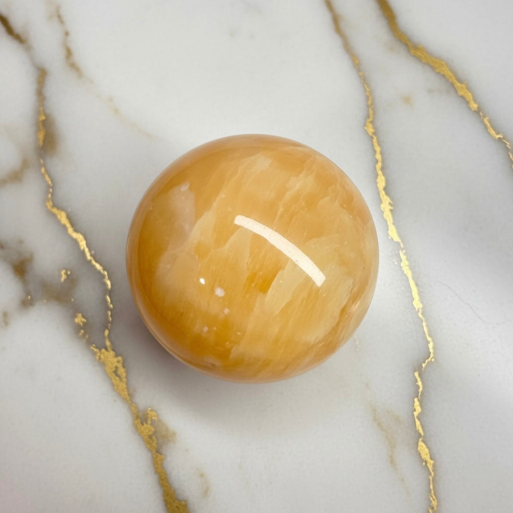 Calcit Kugel - Freude & Licht CrystalScents