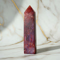 Roter Mondstein Obelisk – Magisches Leuchten CrystalScents