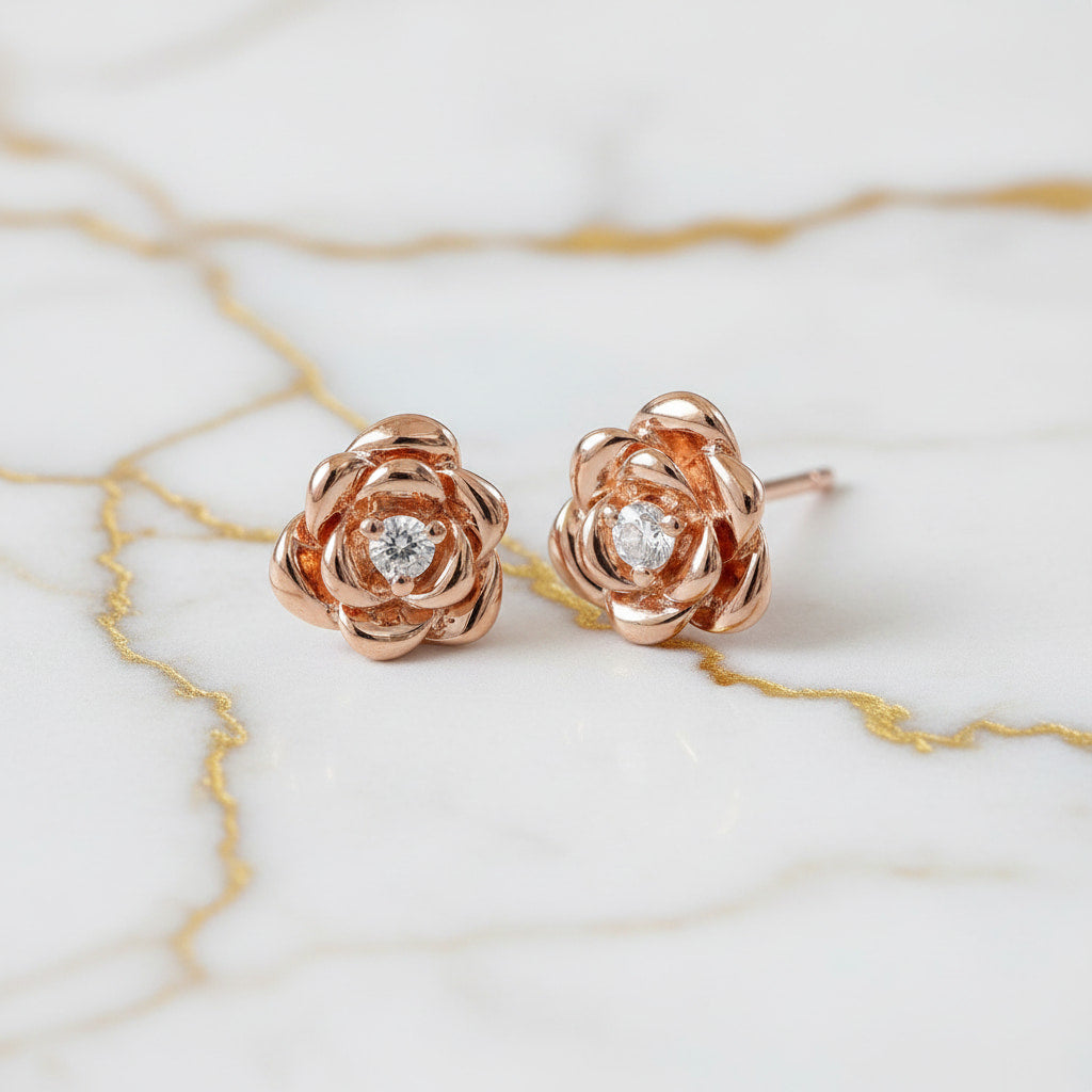 Ohrstecker - Roségold mit filigraner Rosenform CrystalScents