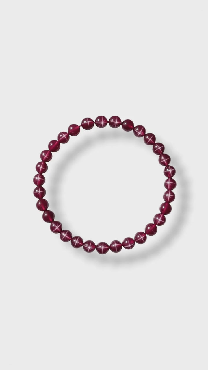 Star Rubin Kugelarmband - Leuchtender Stern-Effekt CrystalScents